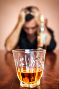 drunk and depressed man addicted to alcohol