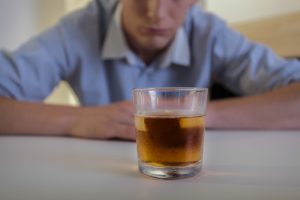 man-struggling-with-alcohol-addiction