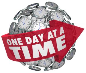 one day at a time clock sphere slow patient progress moving forward